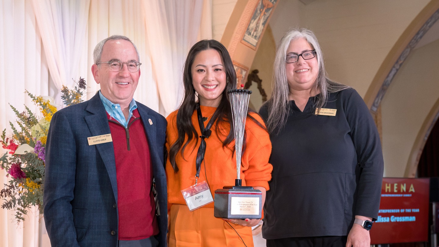 Lloyd Greif, Amy Liu, and Elissa Grossman posing with Liu's Alumni Entrepreneur of the Year Award.