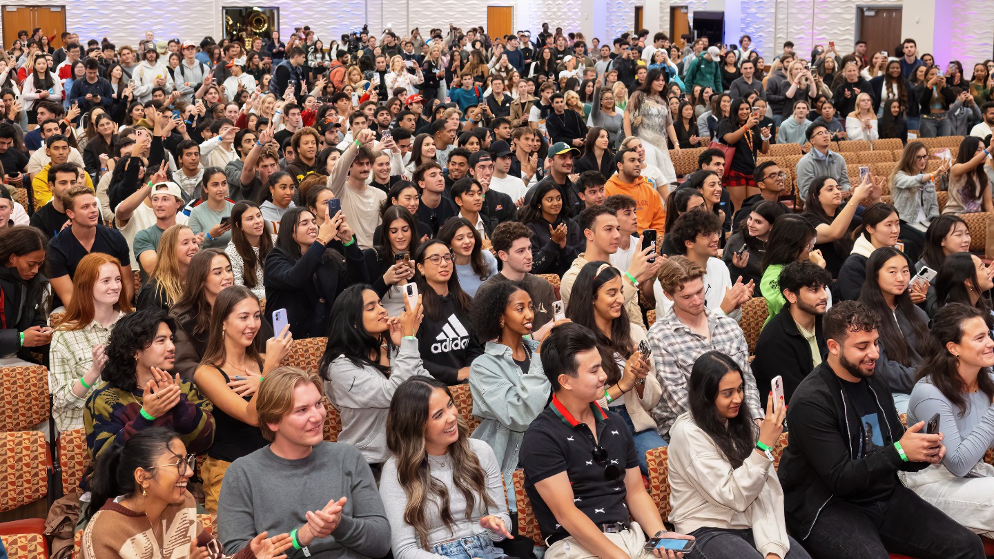 Students snapping photos of the event
