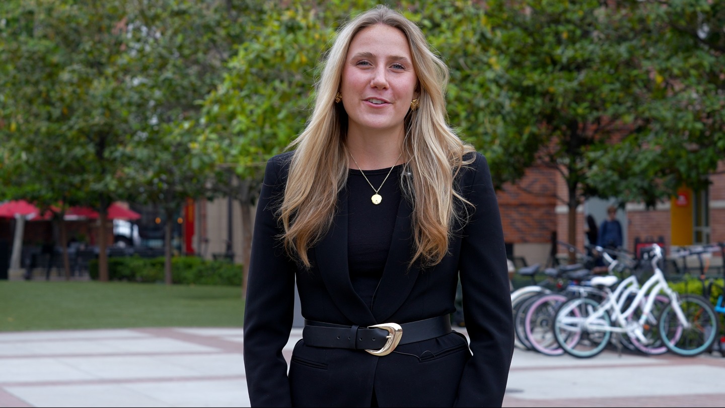 A student speaks on the Trojan Finance Academy