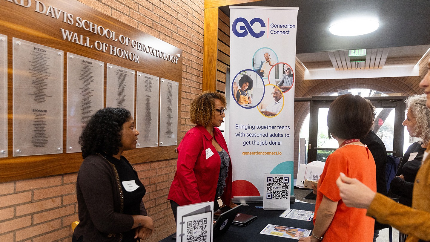 Color photograph of an exhibitor table at the Aging is Now / Aging is the Future: Entrepreneurship Symposium.