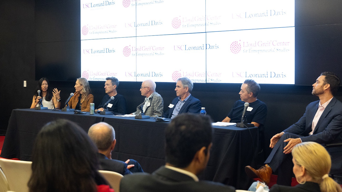 Color photograph of a seven-person panel at the Aging is Now / Aging is the Future: Entrepreneurship Symposium.