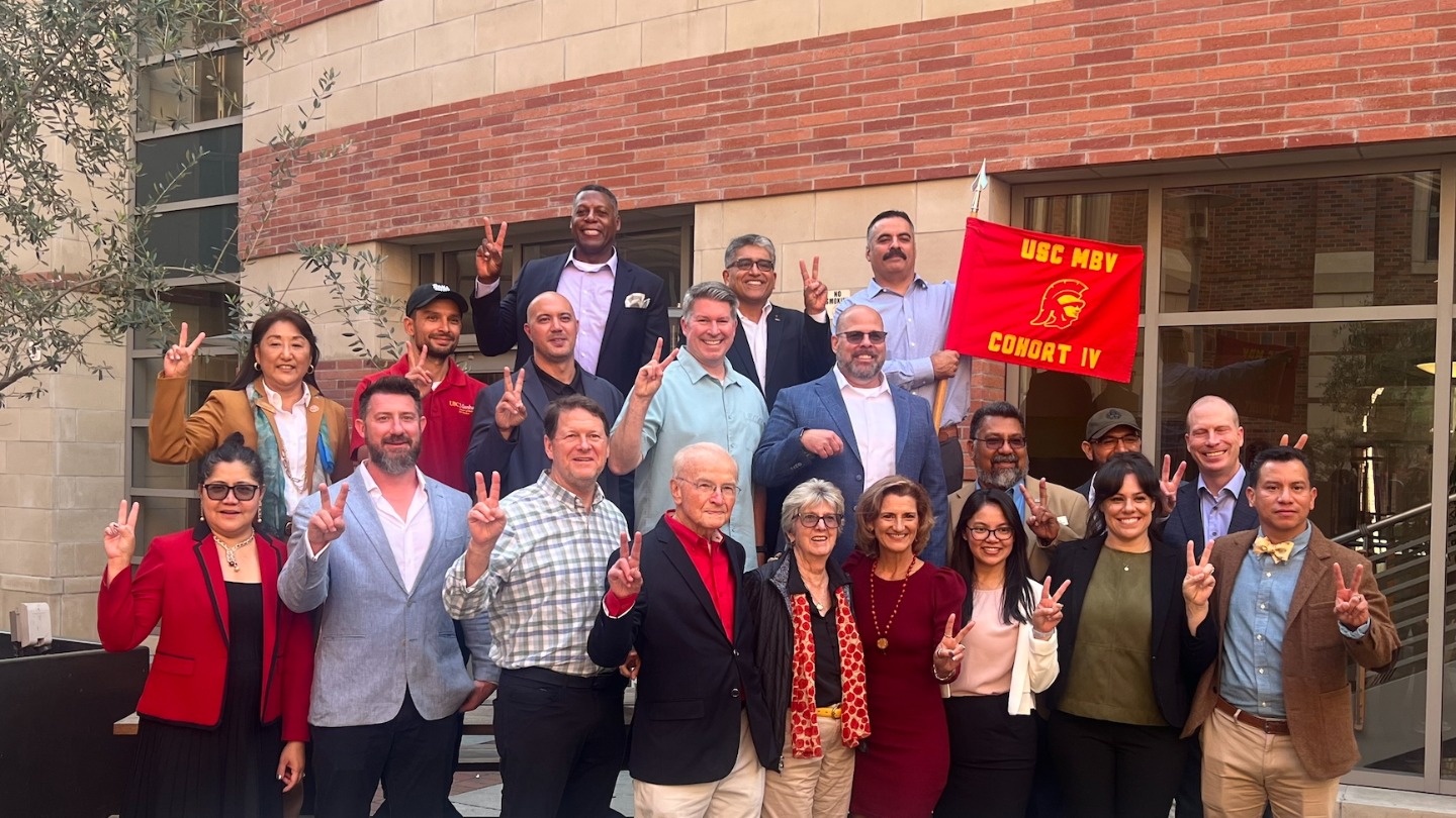 Robert Turrill and MBV Cohorts giving the Fight On sign