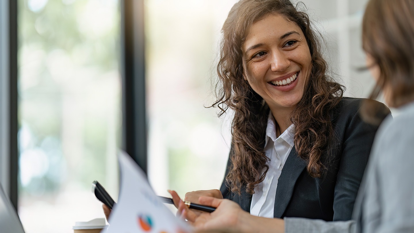Woman engaged in a business meeting.