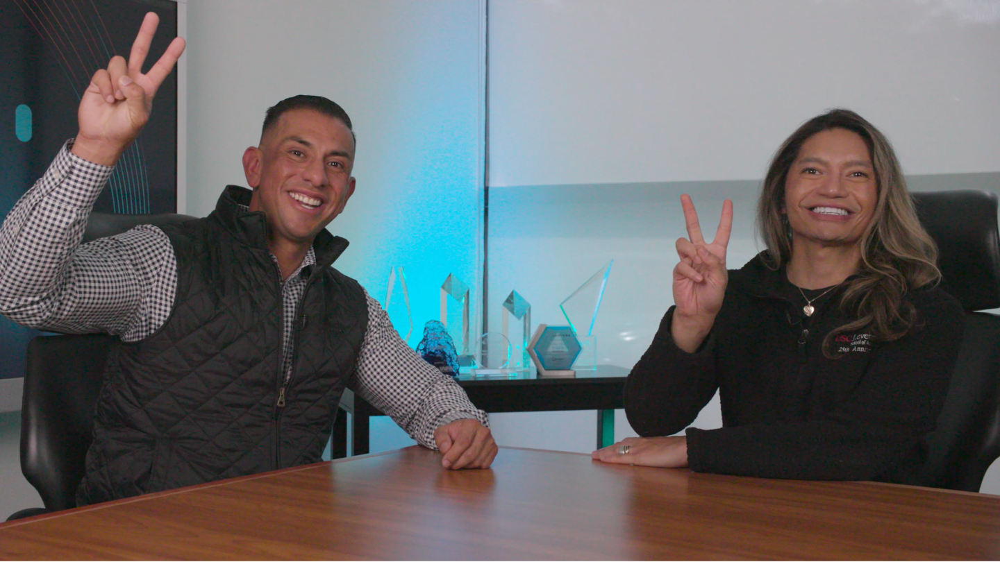 Hector Cabrera and Michael Paranal doing the Fight On sign.
