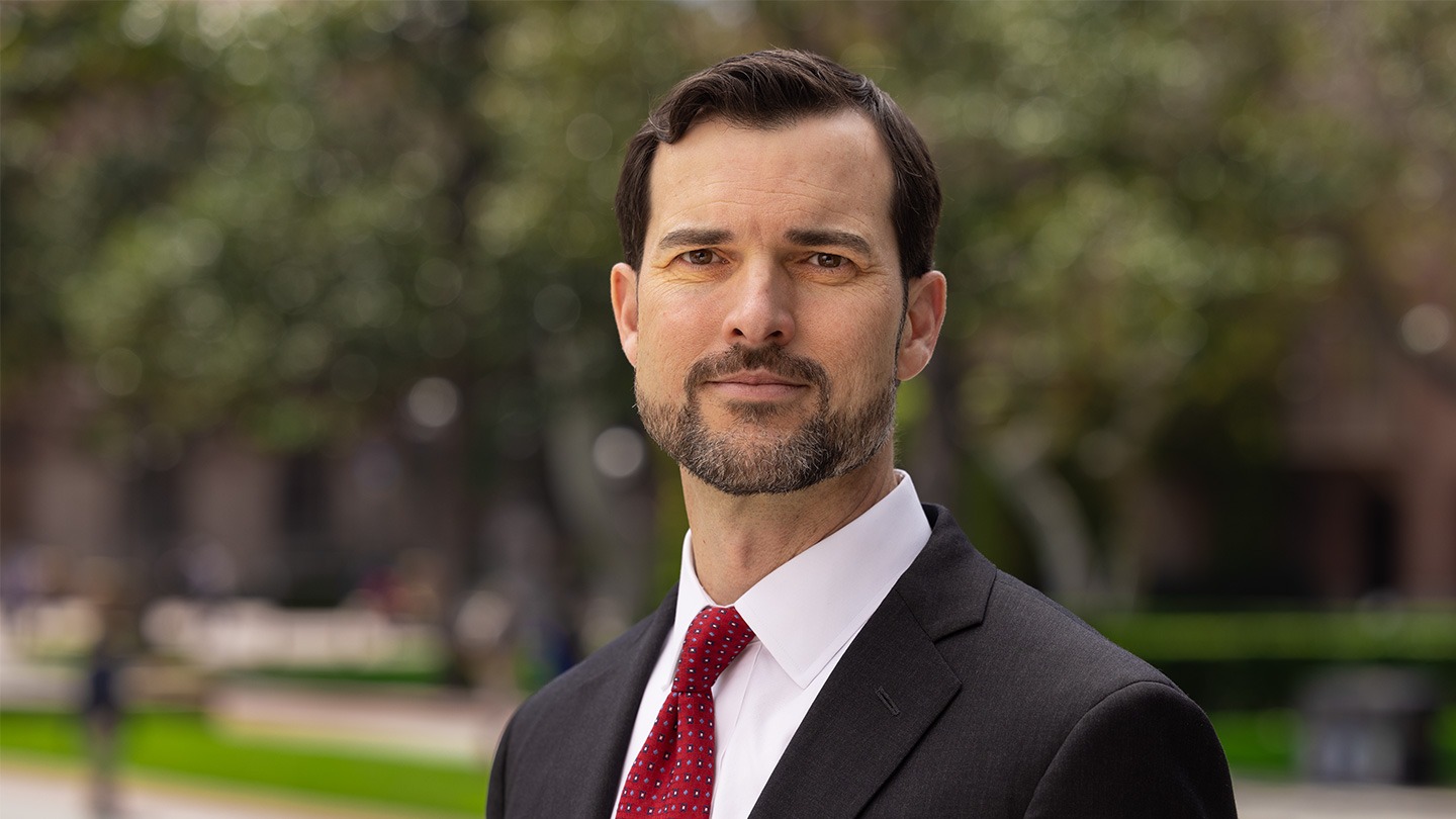 Color photograph of USC Marshall professor Nate Fast.