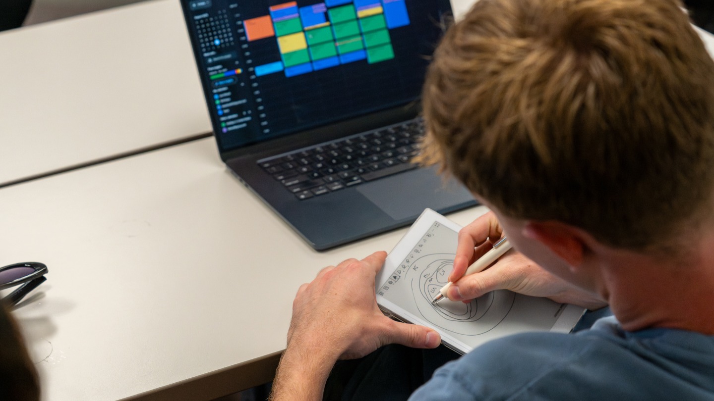 a BUAI student drawing AI models