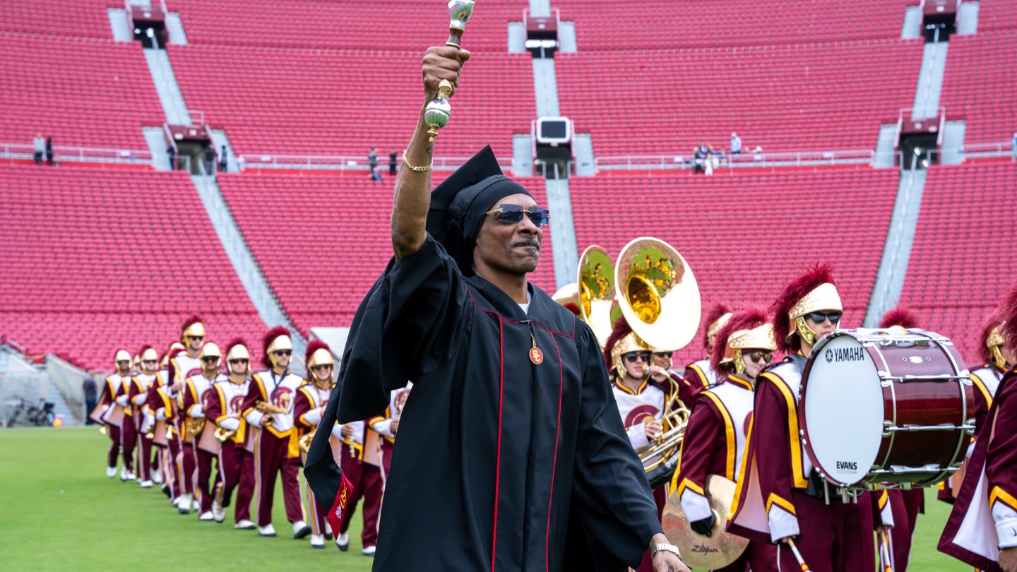Snoop Dogg leads the Trojan Marching Band at Commencement