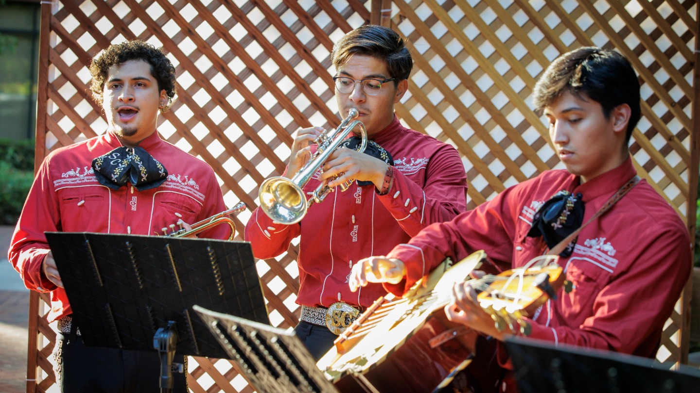 The student mariachi band plays at the conference reception.
