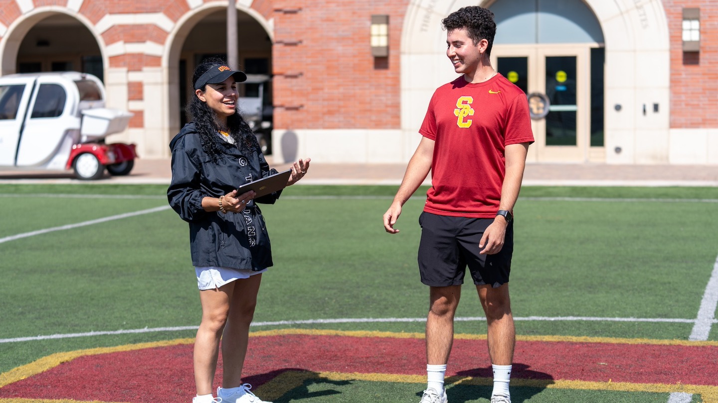 Professor Lorena Martin provides instructions to student Riley Sansone before learning how to test an athlete for balance symmetry.&amp;nbsp;