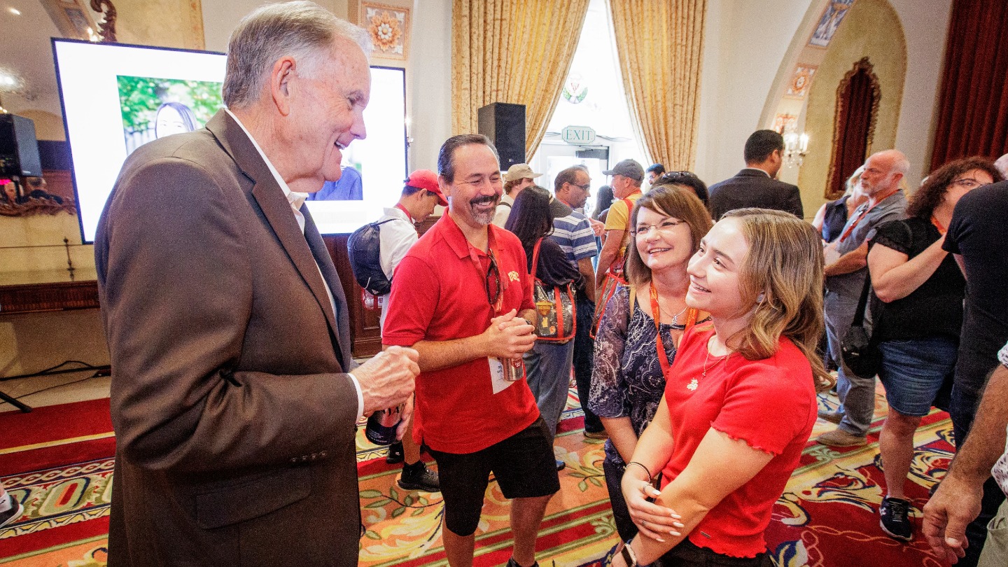 Dean Holder welcomes families at the reception.