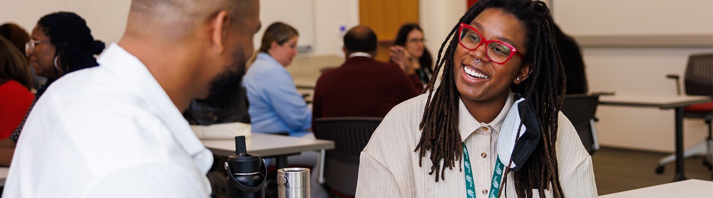 Students interacting in a classroom at USC Marshall.