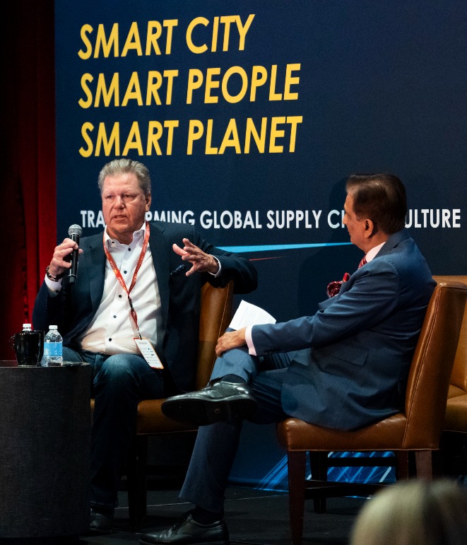Randall Kendrick and Nick Vyas in a fireside chat.