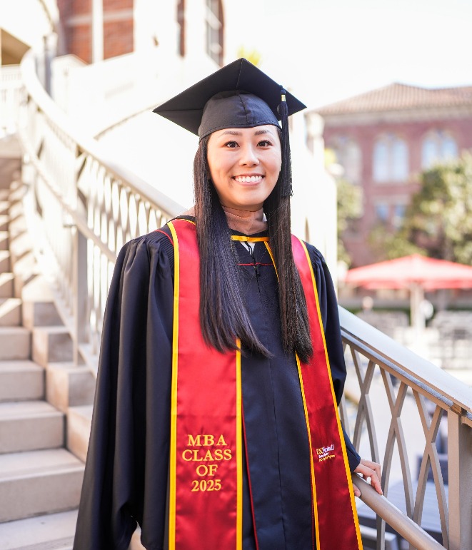 Alice Zhou in graduation gown and mortarboard