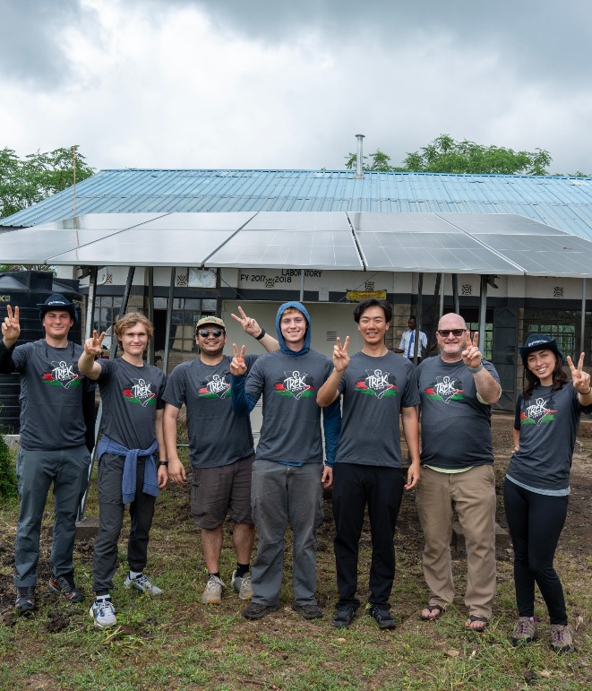 HBSF students in front of a solar panel in Tsavo West