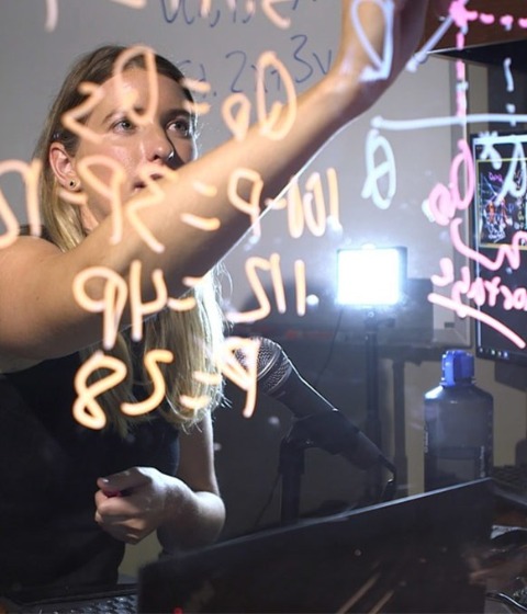 Color photograph of USC Marshall professor Emily Nix teaching an online class.