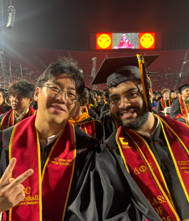 Matthew Kim and a friend at commencement