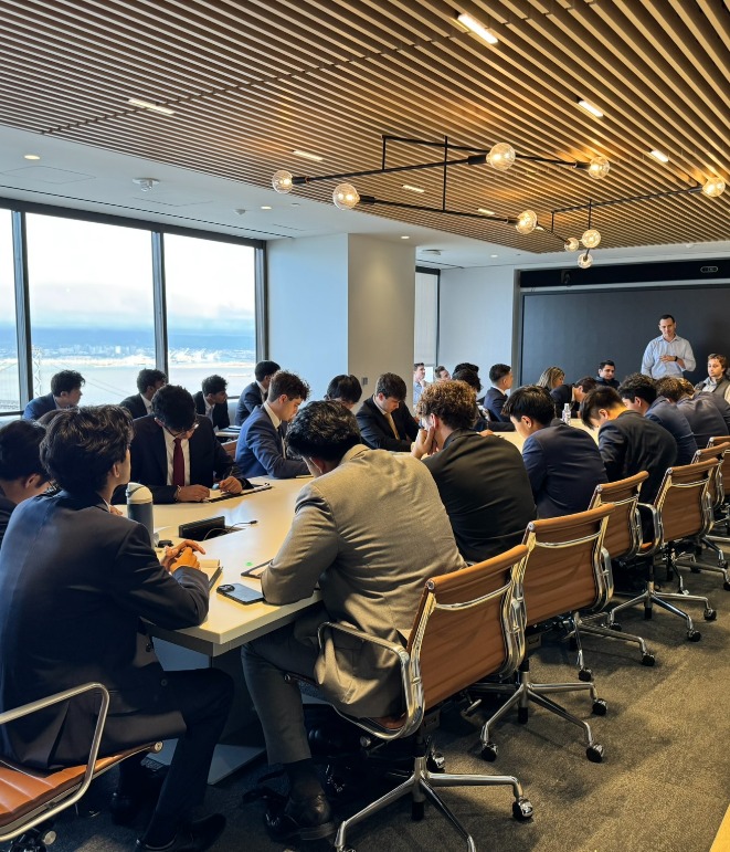 Group of people sitting in a conference room