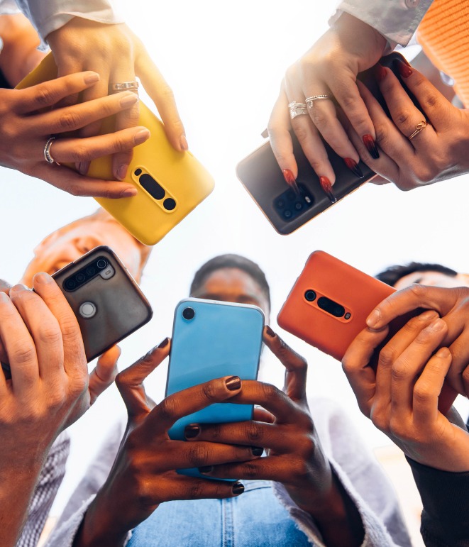 Students using phones in a circle