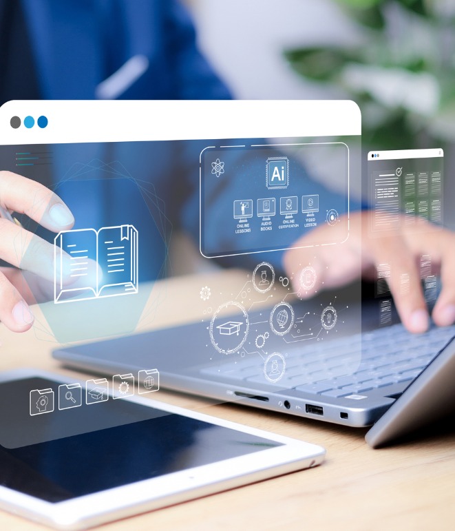 hands typing on a computer with digital screens in front