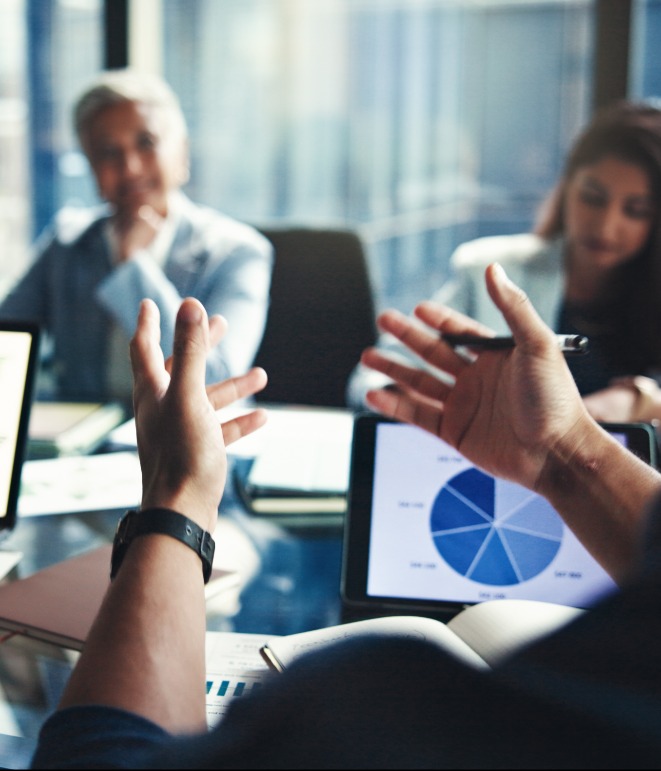 image of person gesturing at meeting