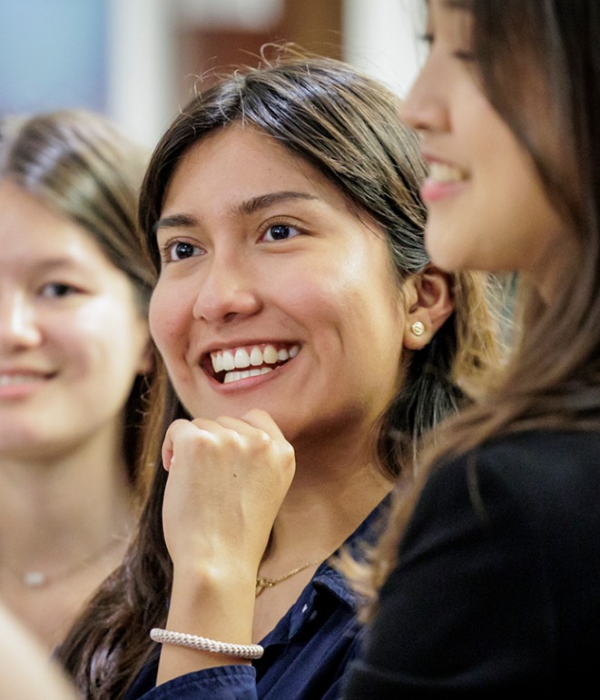 A USC Marshall student actively engaged in a conversation.