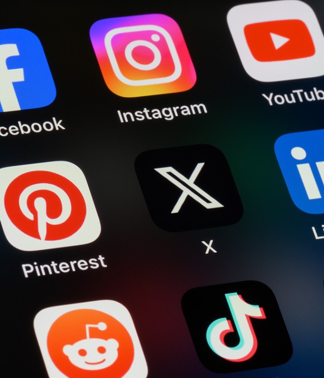 Color photo of multiple social media app icons on a mobile phone