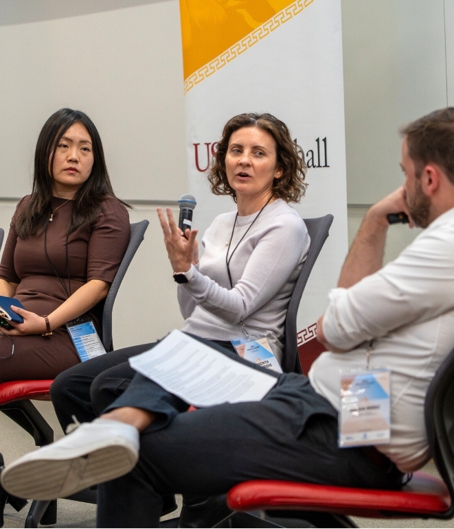 Florenta Teodoridis, Nan Jia, Milan Miric, and Andrew Ogilvie speak on a panel at the summit.