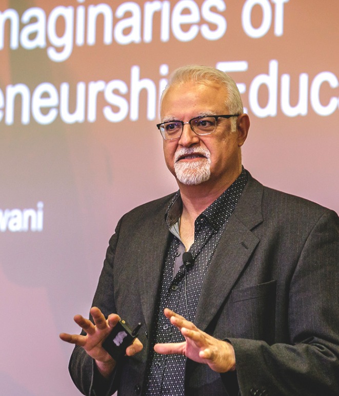 Color photograph of USC Marshall Dan Wadhwani speaking at the 2023 Research Fair.