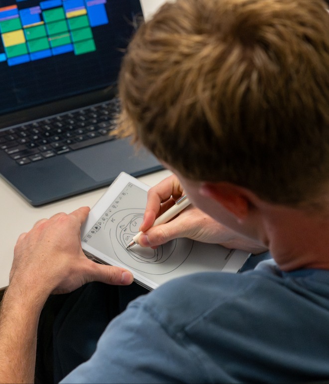 a BUAI student drawing AI models
