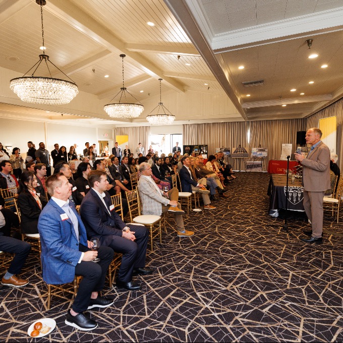 Dean Garrett Speaker to a Group of Alumni