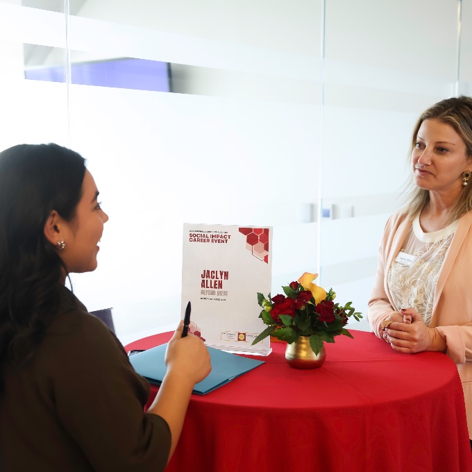 Student and mentor in discussion