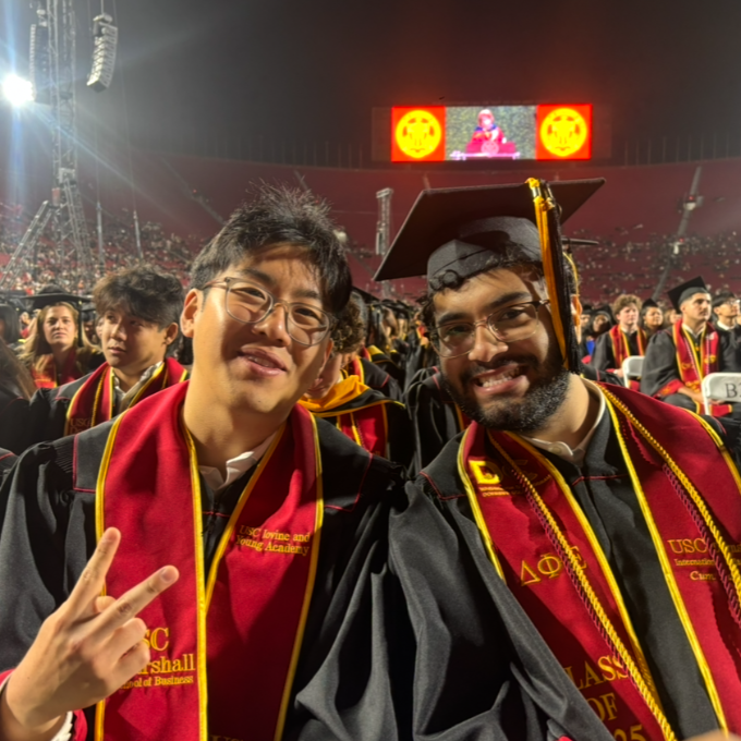 Matthew Kim and a friend at commencement