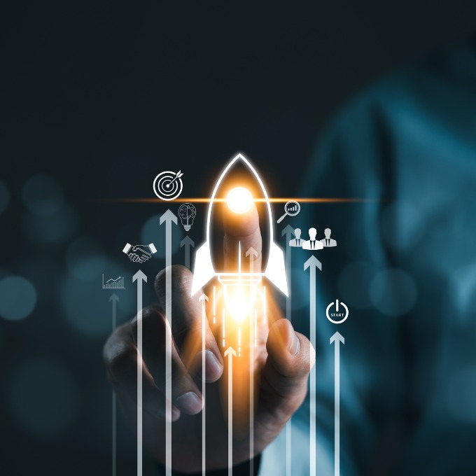 decorative image of rocket with business graphics