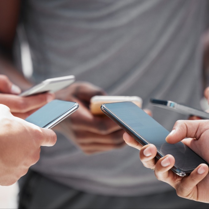 people holding phones