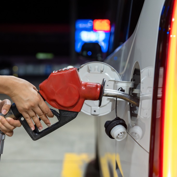 pumping gas in a car
