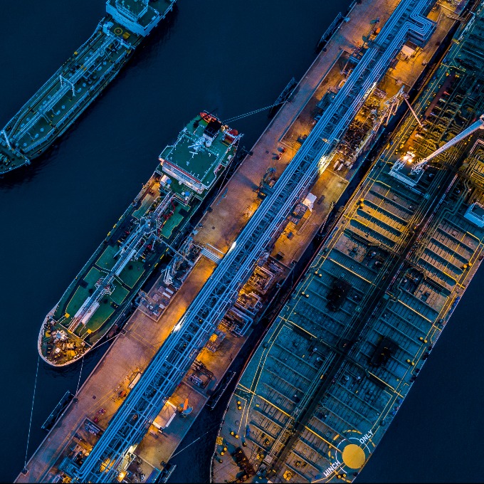 cargo ships pulling into port