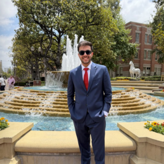 Photo of Sankalp in front of the USC fountain