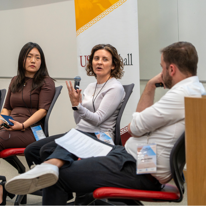 Florenta Teodoridis, Nan Jia, Milan Miric, and Andrew Ogilvie speak on a panel at the summit.