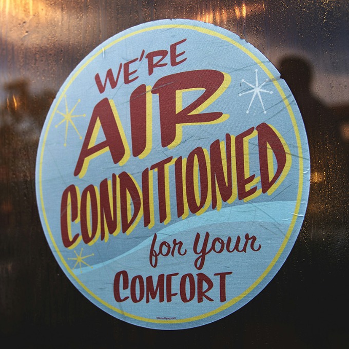 Hand-painted sign reading 