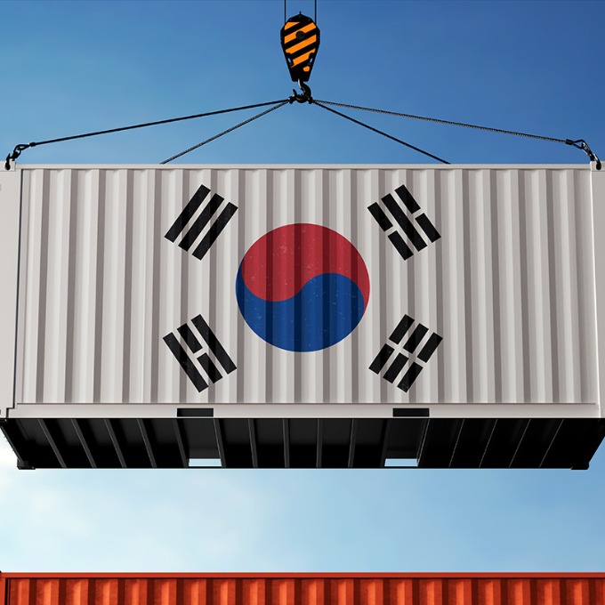 A shipping container with the South Korean flag symbol.