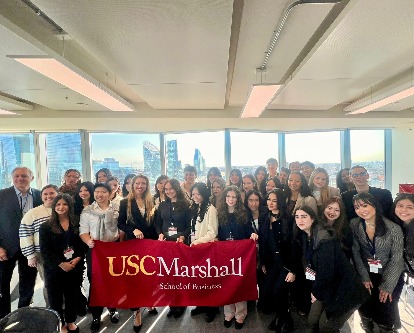 students holding up the Marshall banner in ITaly