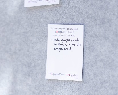 Color photograph of a note reading "Older people want to learn and to be empowered."