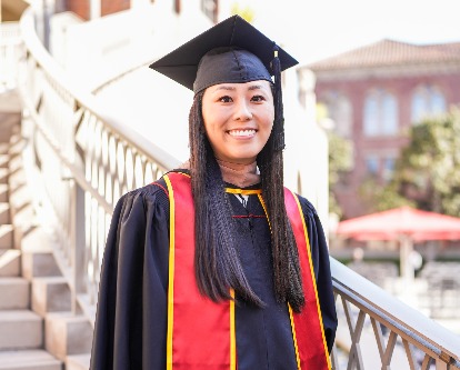 Alice Zhou in graduation gown and mortarboard