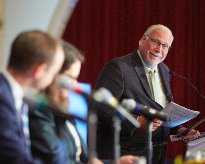 Leventhal Professor Anthony Aaron introduces panelists at the 2024 SEC Conference