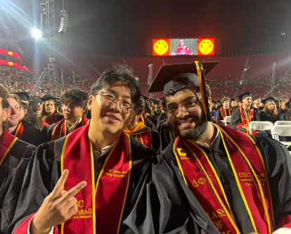 Matthew Kim and a friend at commencement