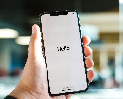 decorative image of iPhone that says &quot;Hello&quot;
