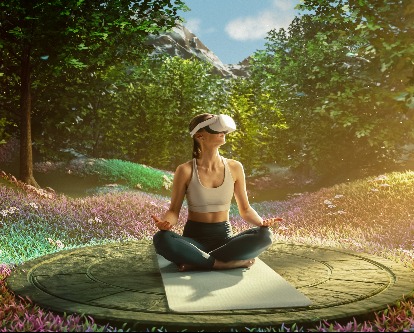 a woman on VR in a grassy clearing.