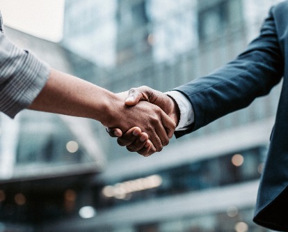 two people shaking hands