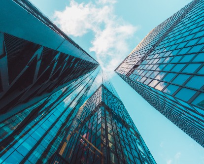 Three buildings pointing to the sky