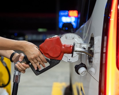 pumping gas in a car